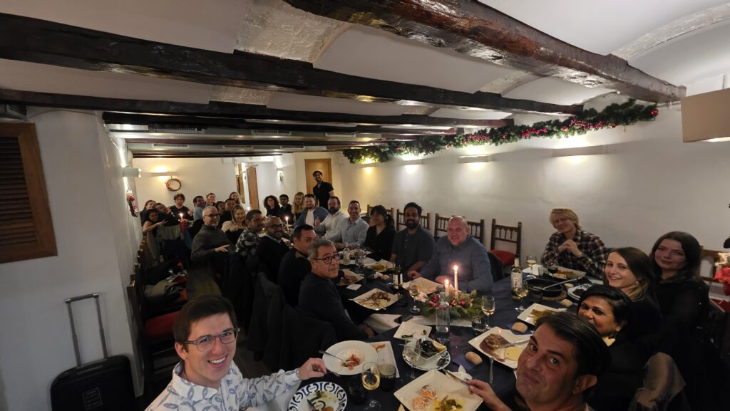 New Year’s Eve dinner at Sporting Restaurant in Gràcia with an international group enjoying a festive meal in Barcelona
