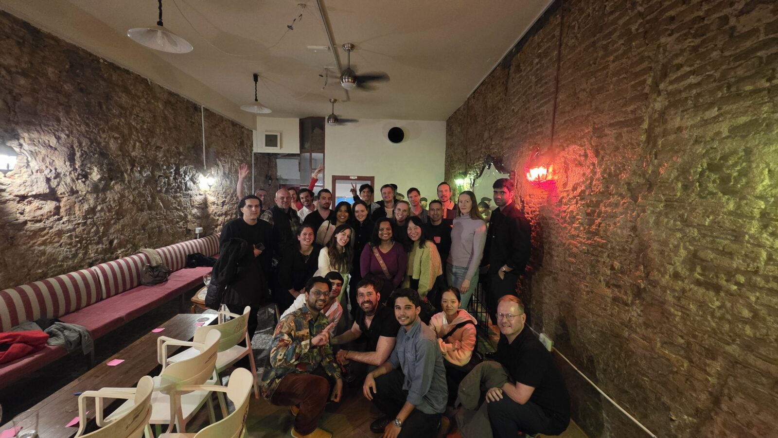 People socializing during a Valentine’s Day meetup event in a bar in Barcelona